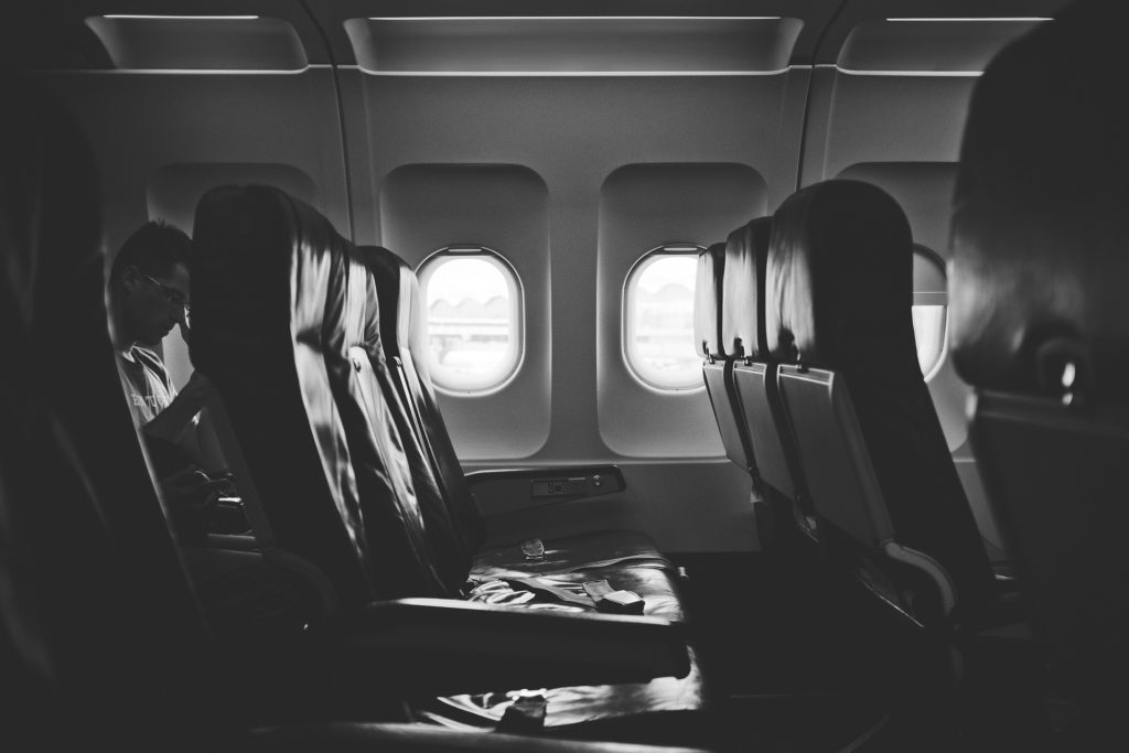 an empty airplane aisle